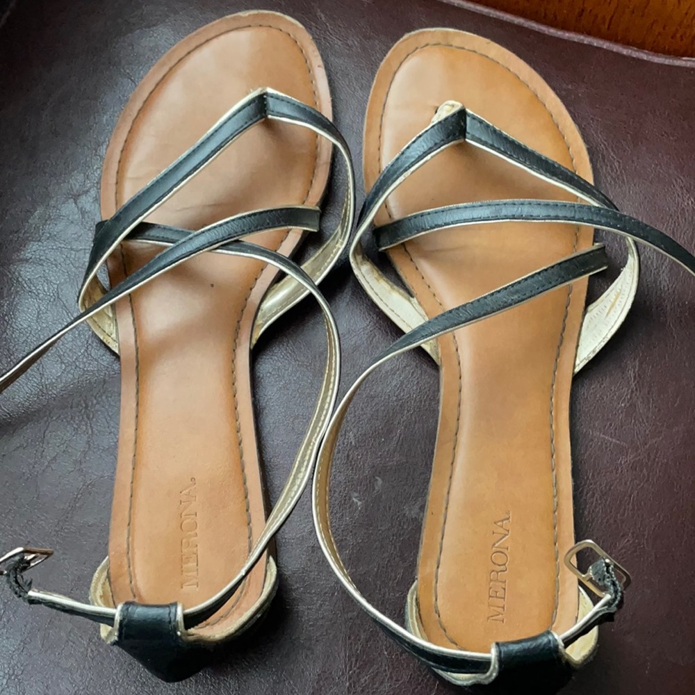 Black and gold gladiator flats
